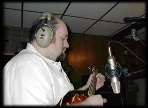 George records a mandolin part.